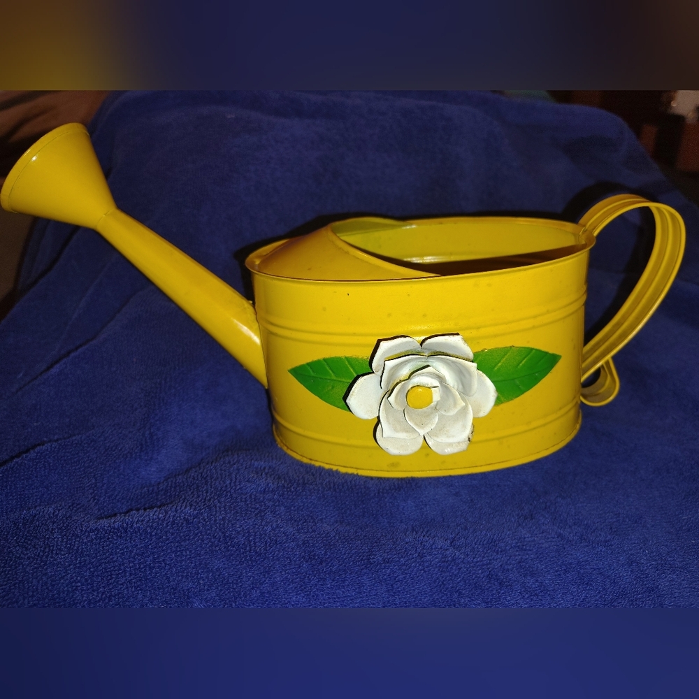 vintage Teleflora yellow watering can